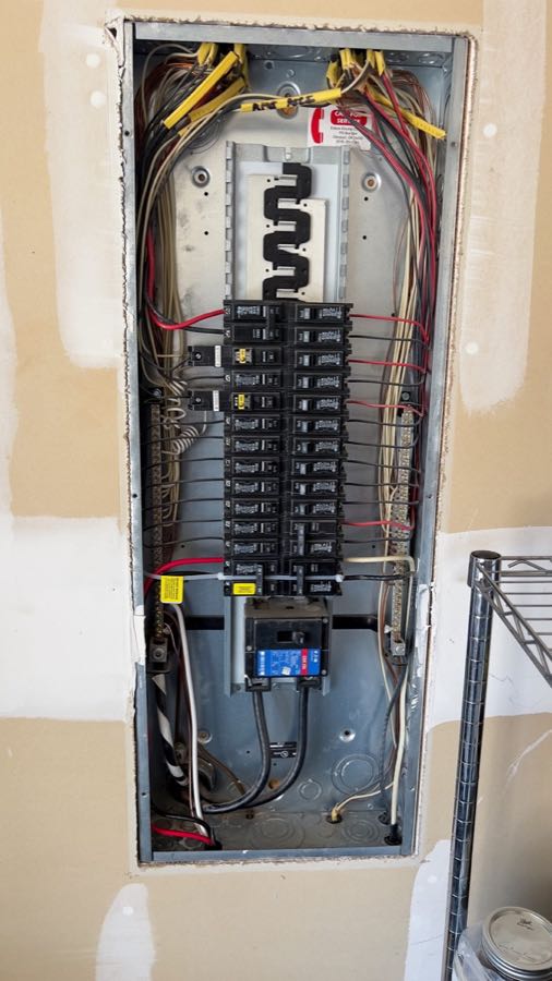 Full breaker panel replacement by Epic Electric inside a Tulsa garage